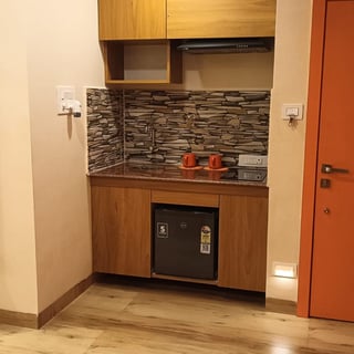 Kitchenette Suite — Private kitchenette at Coral Hotel Vizag, gallery view 2